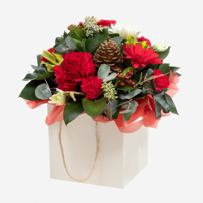 A Christmas Carol - A selection of customer favourite flowers and foliage in a design that’s simply the perfect Christmas present.
