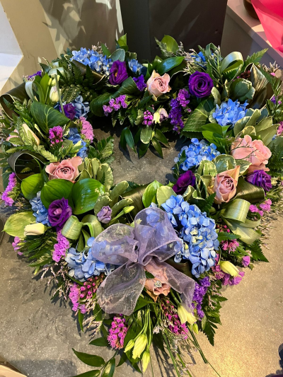 Open Heart - Heart shaped tribute in a mix of flowers in shades of pinks, purples and blues